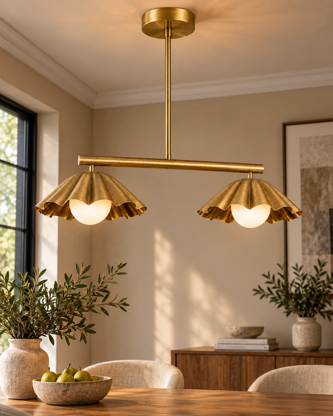 WINTTEN scalloped brass linear chandelier with two sculptural brass shades and glass globes