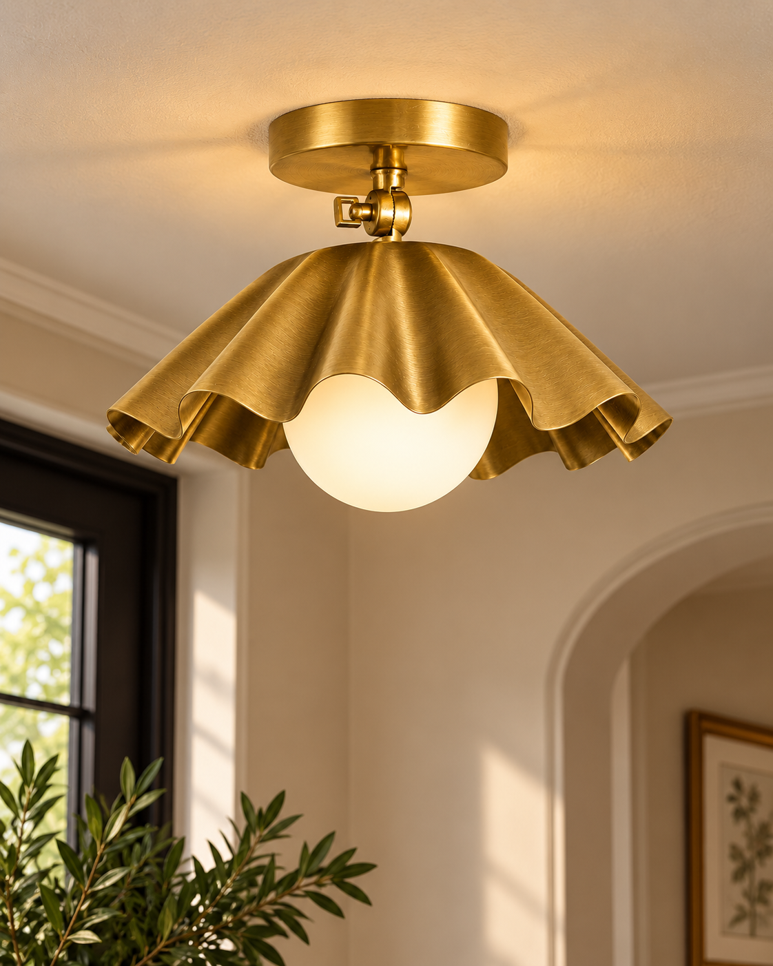 Scalloped brass ceiling light with glass globe diffuser